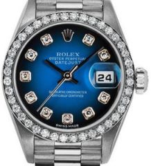 Rolex Women’s White Gold President with Factory Diamond Bezel and Blue Vignette Diamond 69139 Rolex Women’s White Gold President with Factory Diamond Bezel and Blue Vignette Diamond 69139